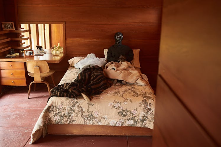 A mannequin in Billy Reid's spring 2018 look placed in a bedroom in Frank Lloyd Wright’s Rosenbaum H...