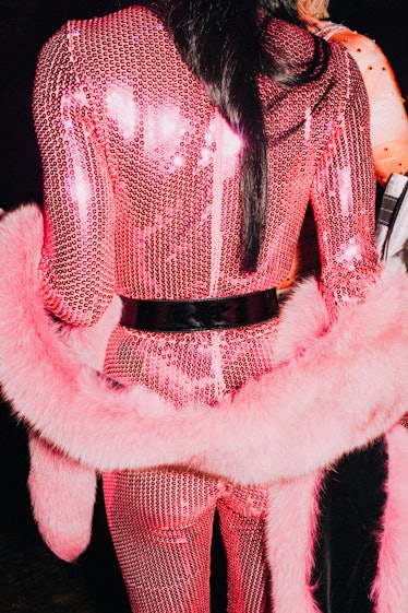 Kyle Farmery in a pink sequin jumpsuit and a pink scarf at Marc Jacobs and RuPaul’s Drag Ball