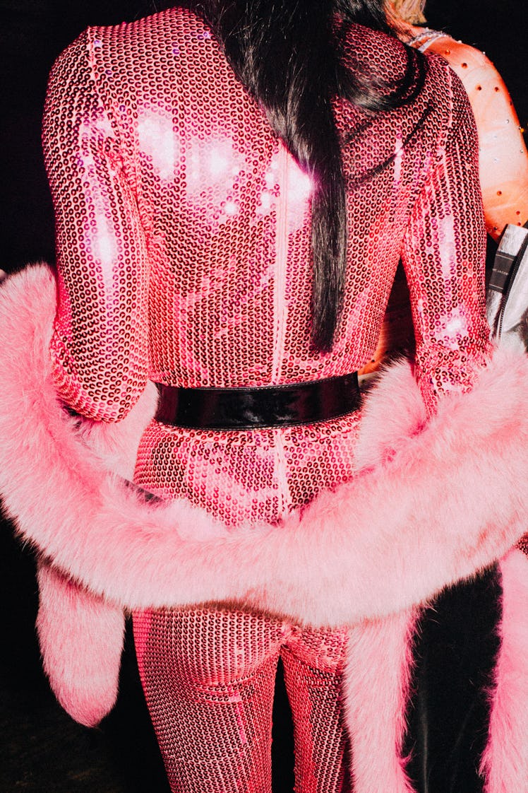 Kyle Farmery in a pink sequin jumpsuit and a pink scarf at Marc Jacobs and RuPaul’s Drag Ball