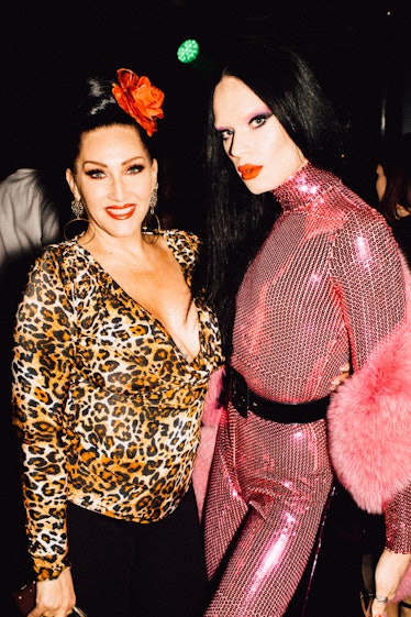 Michelle Visage in a leopard print top and Kyle Farmery in a pink sequin jumpsuit at Marc Jacobs and...
