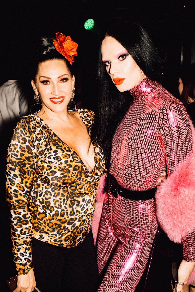 Michelle Visage in a leopard print top and Kyle Farmery in a pink sequin jumpsuit at Marc Jacobs and...