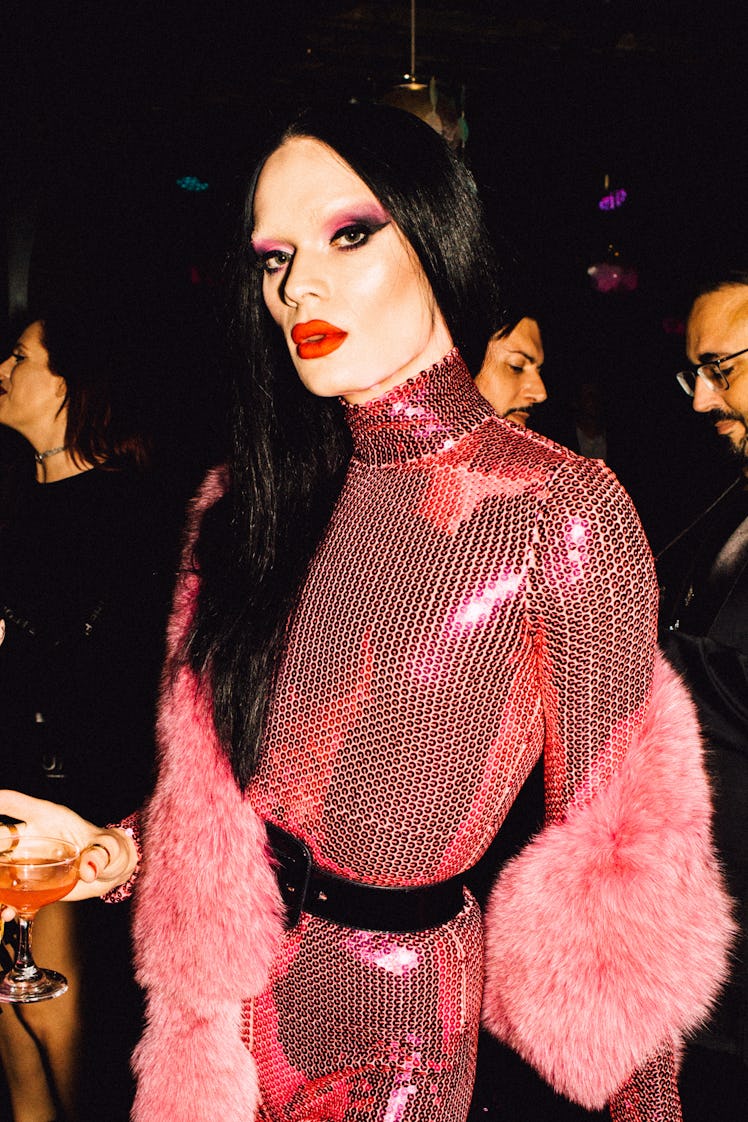 Kyle Farmery in a pink sequin jumpsuit and pink fur scarf at Marc Jacobs and RuPaul’s Drag Ball