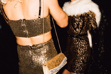 Two people wearing gold sequin outfits at Marc Jacobs and RuPaul’s Drag Ball