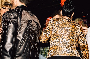 A guest in a black leather jacket and a guest in a leopard print jacket at Marc Jacobs and RuPaul’s ...