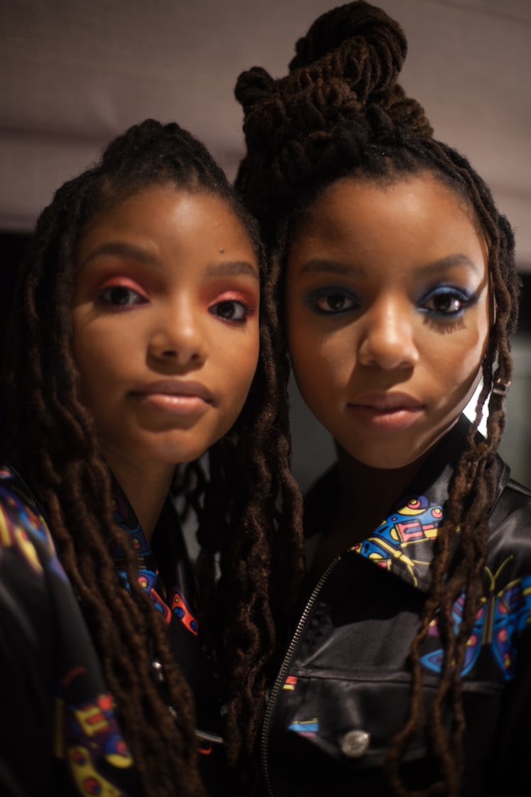 Chloe and Halle Bailey taking a selfie before their first Jeremy Scott Fashion Show