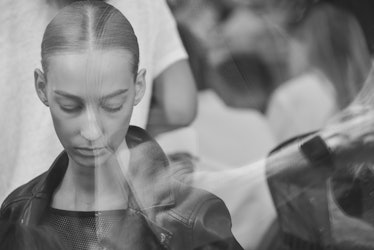 A black and white photo backstage at the Maryam Nassir Zadeh Spring/Summer 2018 show