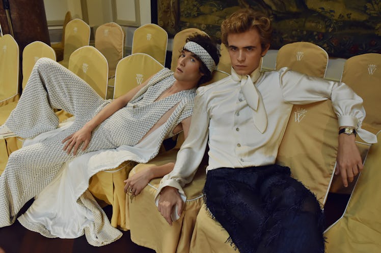 Two models sitting on chairs while wearing Palomo Spain SS18 outfits 