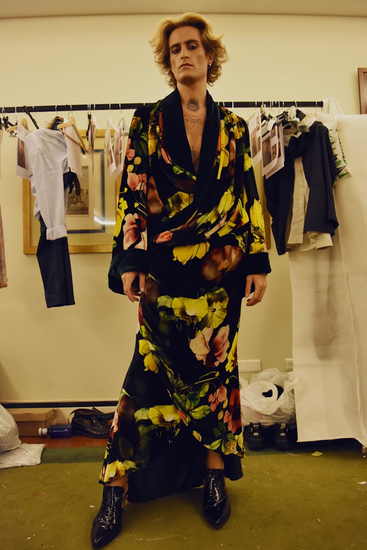 A model wearing a black-yellow-pink floral dress at the Palomo Spain SS18 runway