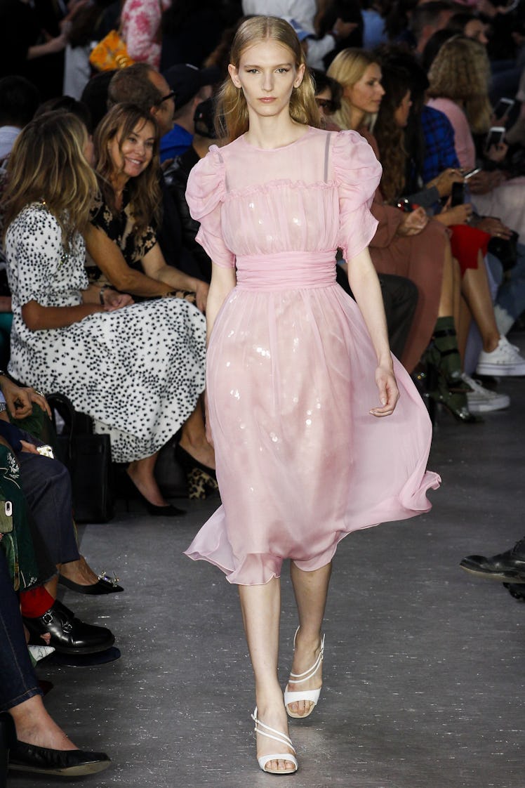 A model walking the runway in a pink dress for NO. 21’s show during Milan Fashion Week’s Spring 2018
