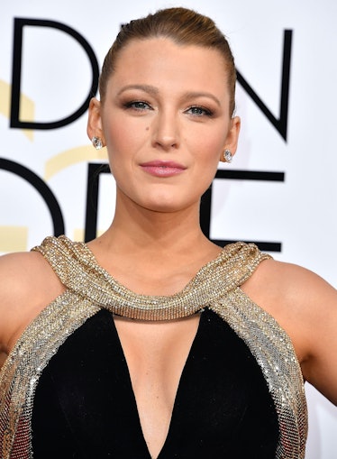 Blake Lively wearing sleek knotted up do haircut at the 74th Annual Golden Globe Awards.