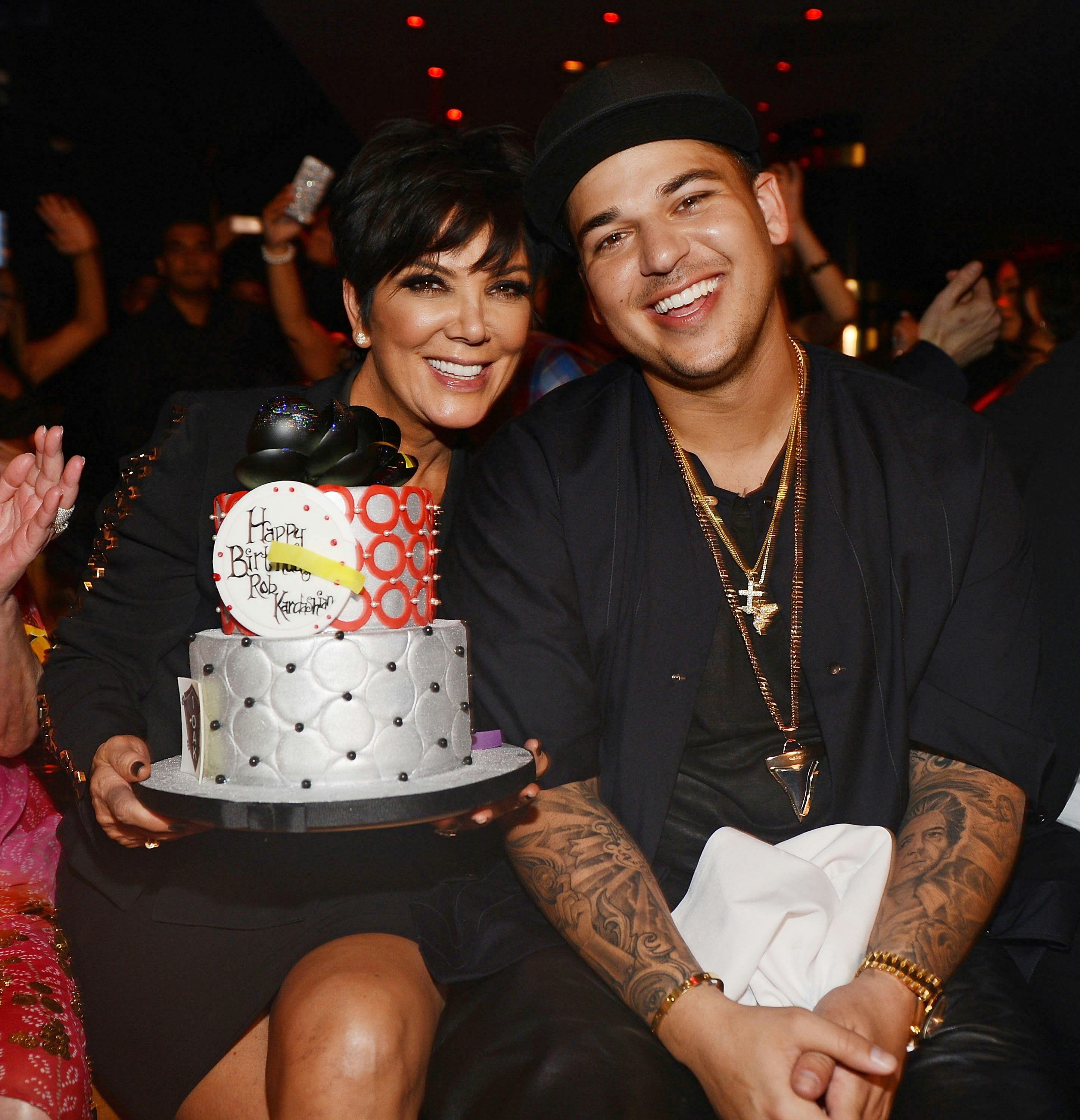 A Brief History of Kardashians Posing with Extravagant Birthday Cakes