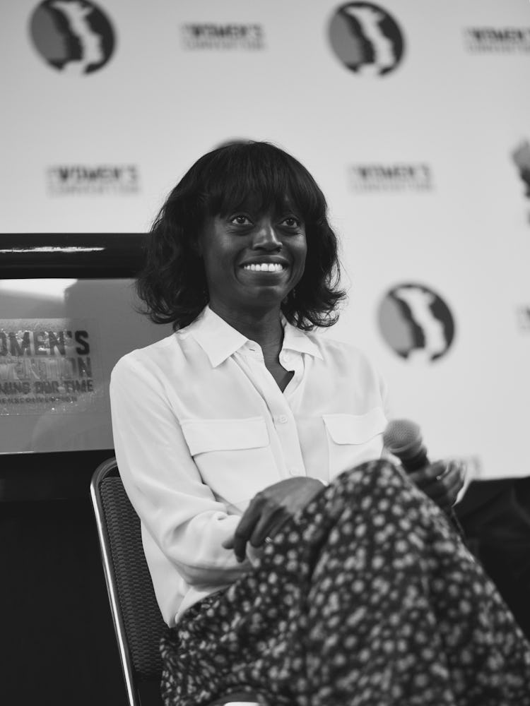 A woman smiling during the 2017 Women’s Convention, hosted in Detroit.