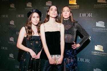 The Haim Sisters Attend the Louis Vuitton Show at Paris Fashion Week – WWD