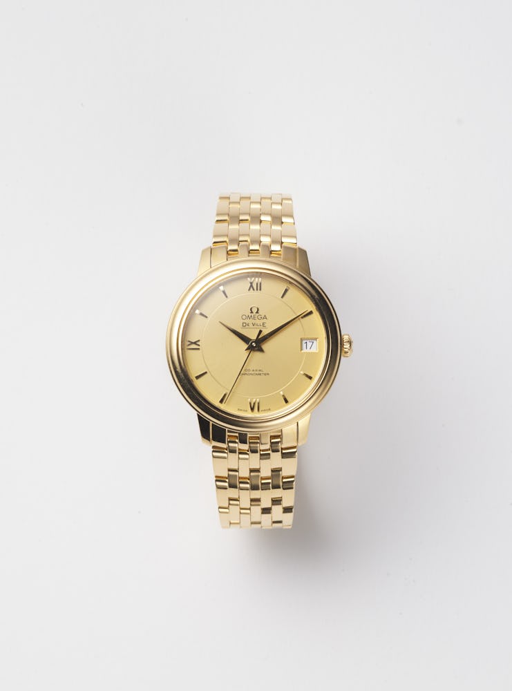 A gold Omega watch