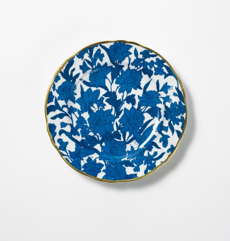 A blue and white La DoubleJ Housewives plate