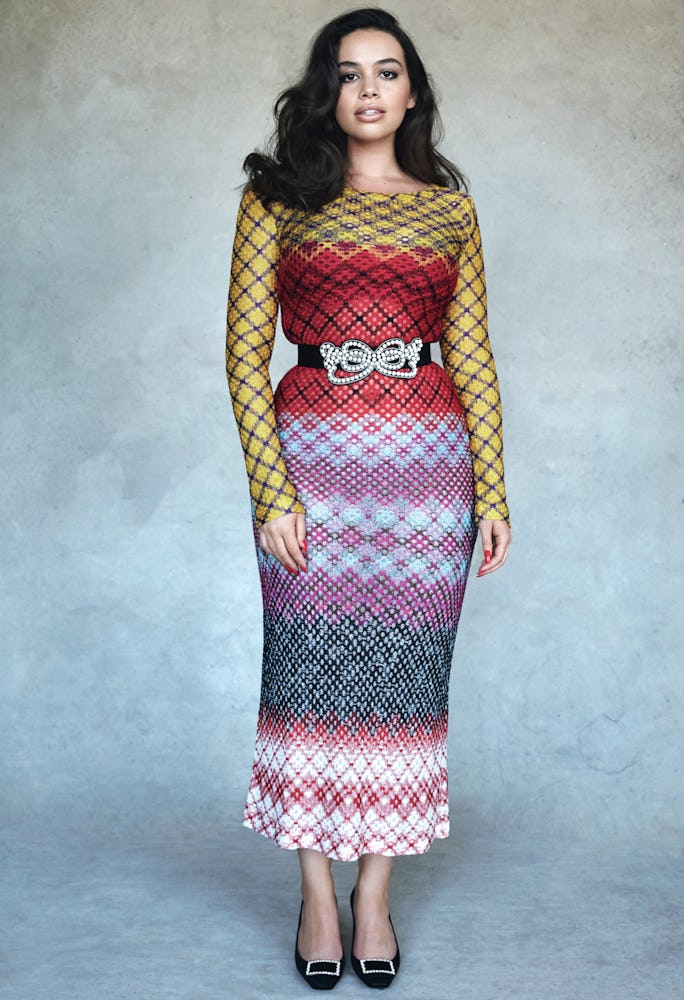 A model in a multi-colored Missoni dress and a black Fendi Belt