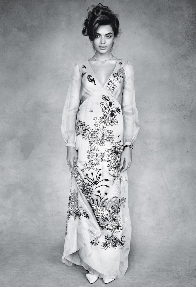 A model in a floral Alberta Ferreti dress in black and white