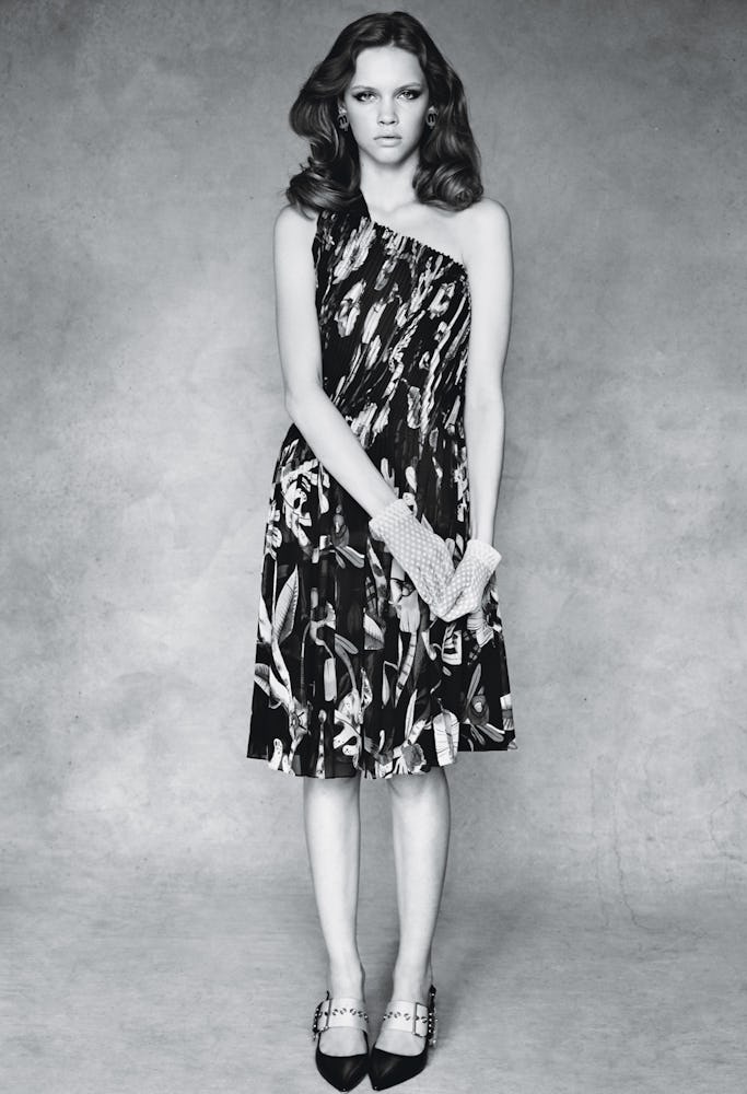 A model sporting an asymmetric Giorgio Armani dress in black and white