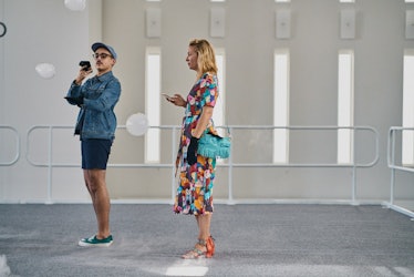 Visitors of the contemporary artworks showcase at Art Basel Miami