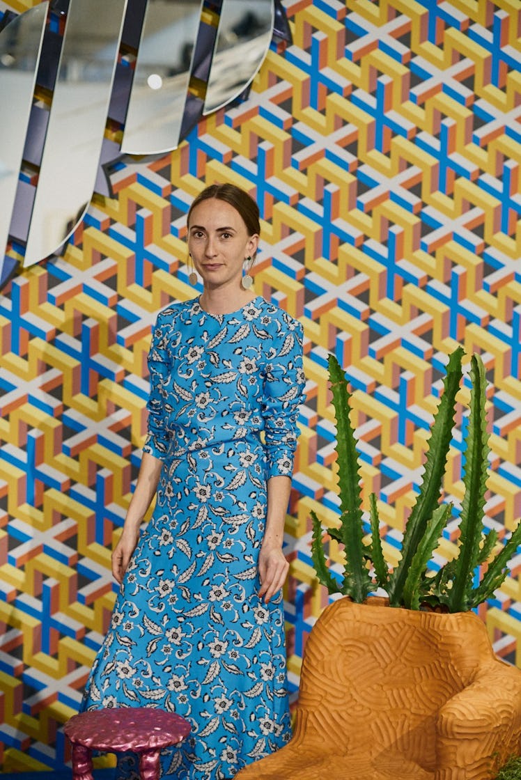 Patrick Parrish gallery director Zoe Fisher wearing a blue patterned dress at Art Basel Miami