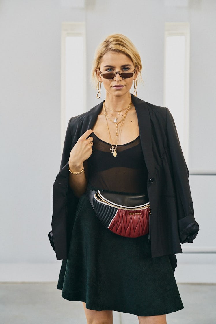 A woman wearing street style attending Art Basel Miami international art fair