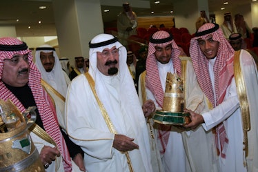 Saudi King Abdullah bin Abdul Aziz (C),