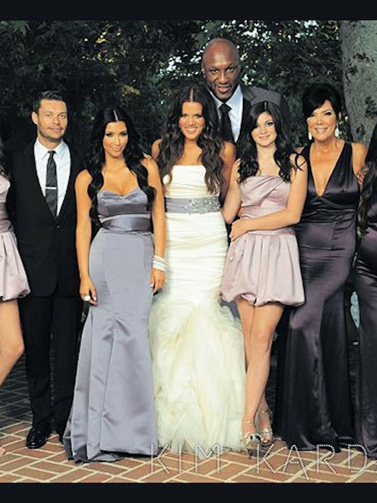 A Christmas card with Ryan Seacrest, Kim and Khloe Kardashian, Kylie and Kris Jenner and Lamar Odom ...