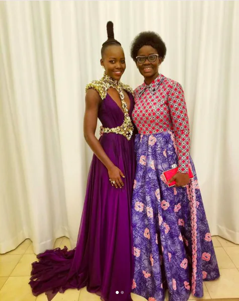lupita nyong'o purple dress Lupita Nyong'o wears a pretty purple dress for NAACP's Act-So award  ceremony where she surprised 40 students with education scholarships # LupitaNyongo Photos: Getty