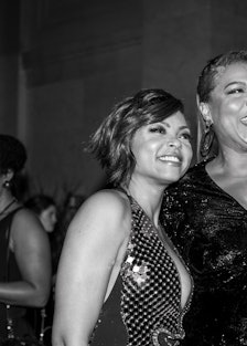 Taraji P. Henson and Queen Latifah posing for a photo in black and white
