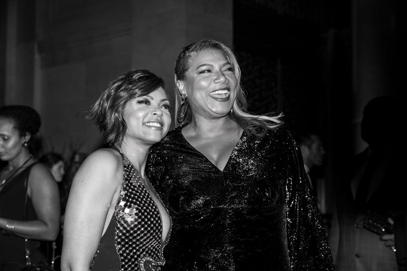 Taraji P. Henson and Queen Latifah posing for a black and white photo