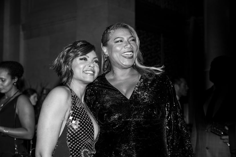 Taraji P. Henson and Queen Latifah posing for a black and white photo 