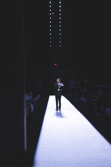 A man in a formal suit on the runway at the Tom Ford Fall 2018 show