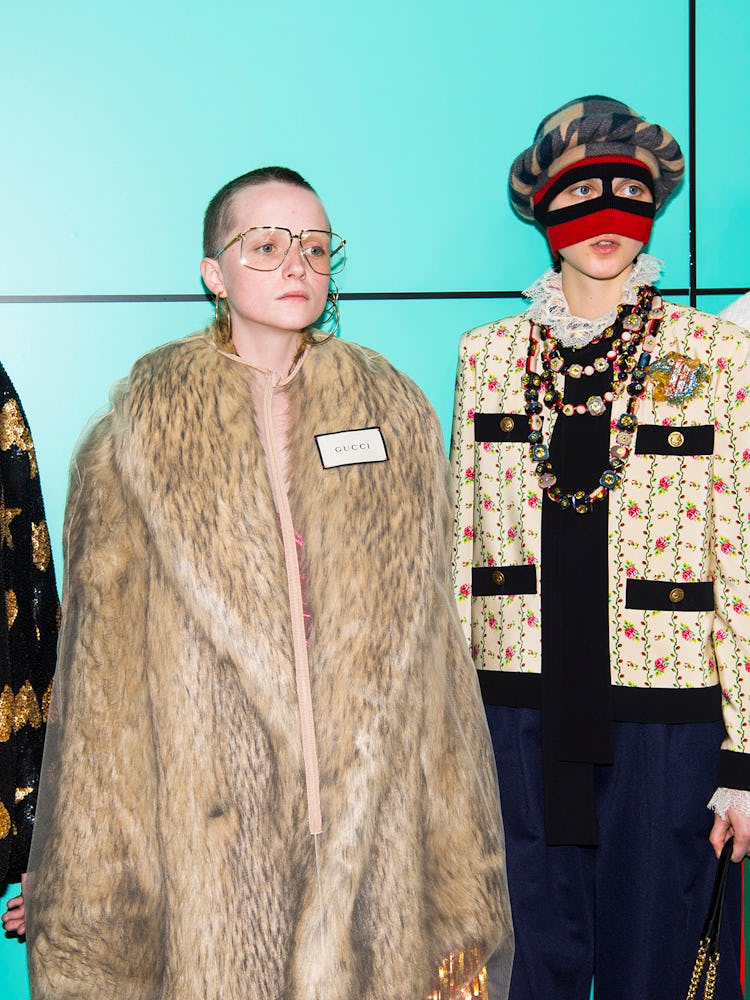 Models backstage at the Gucci Fall 2018 runway show 