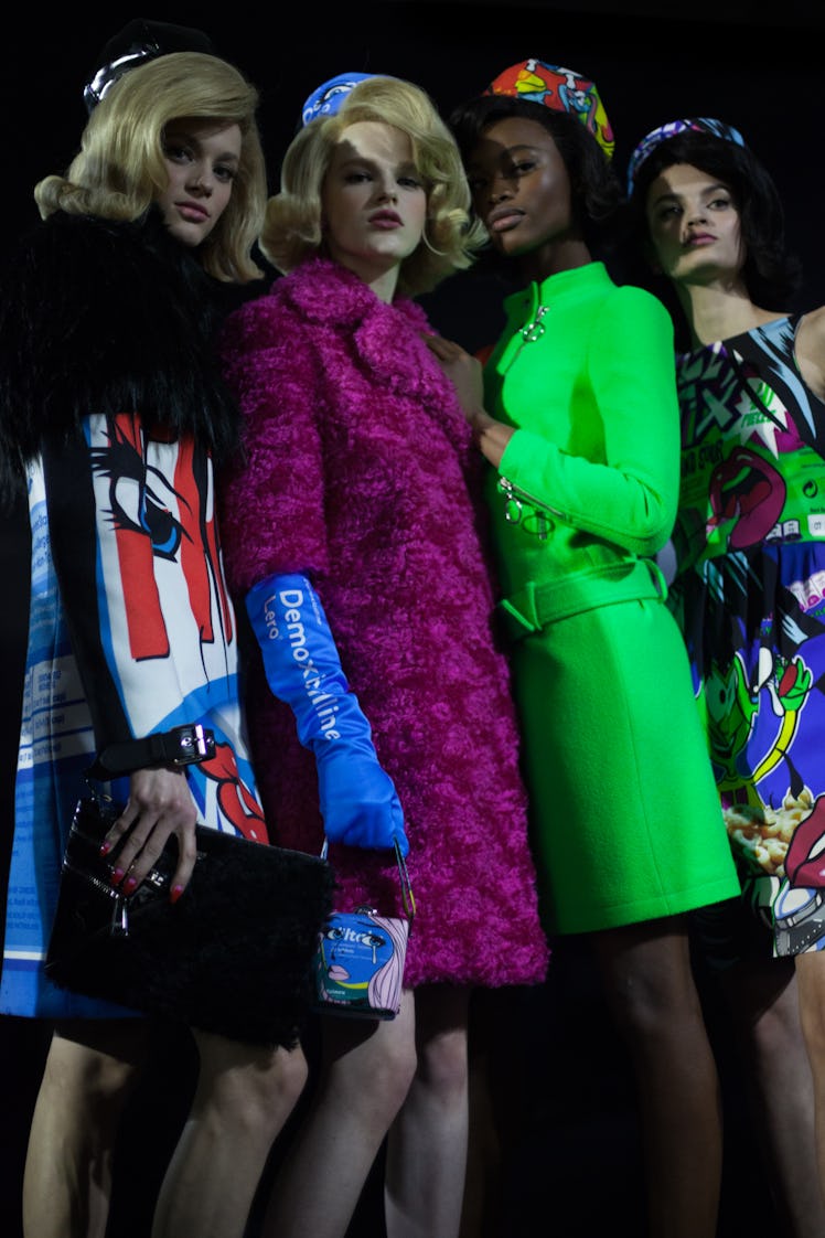 Models backstage at the Moschino Fall 2018 show during Milan Fashion Week
