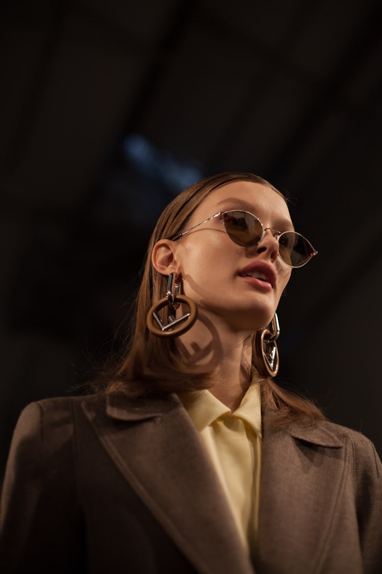 A model backstage at the Fendi Fall 2018 show during Milan Fashion Week
