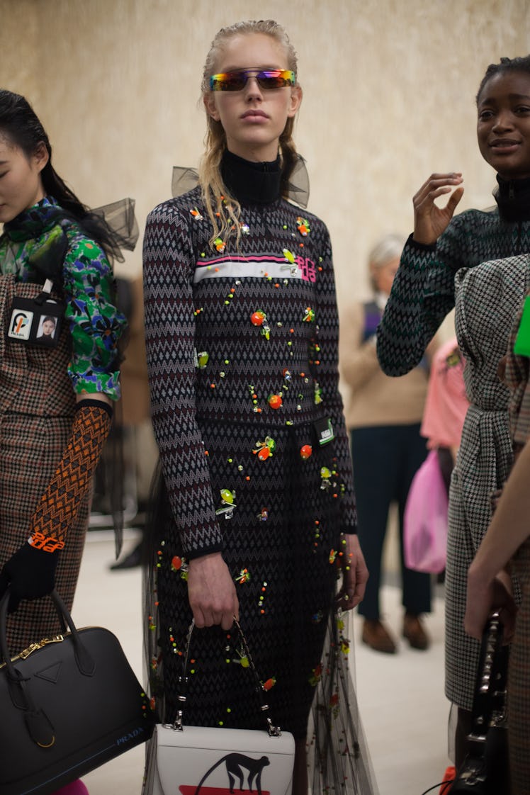 Models wearing Prada Fall 2018 during Milan Fashion Week
