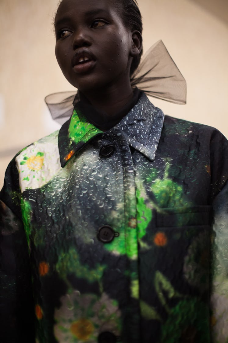 A model wearing a look from Prada Fall 2018 during Milan Fashion Week