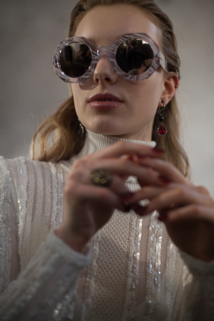 A model wearing shades at the Roberto Cavalli Fall 2018 show during Milan Fashion Week