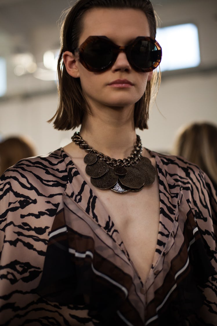 Cara Taylor backstage at the Roberto Cavalli Fall 2018 show during Milan Fashion Week