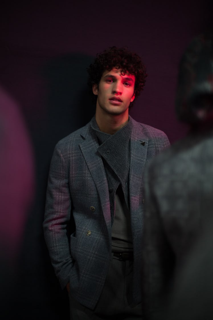 A model wearing a grey suit for Giorgio Armani Fall 2018 show during Milan Fashion Week