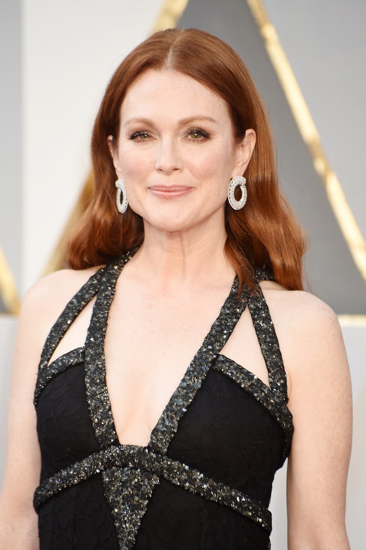 Julianne Moore in a black dress with shimmery straps and her hair down at the Oscars 