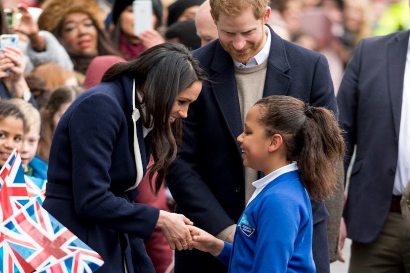 meghan-markle-broke-royal-protocol-on-hugging-lead.jpg