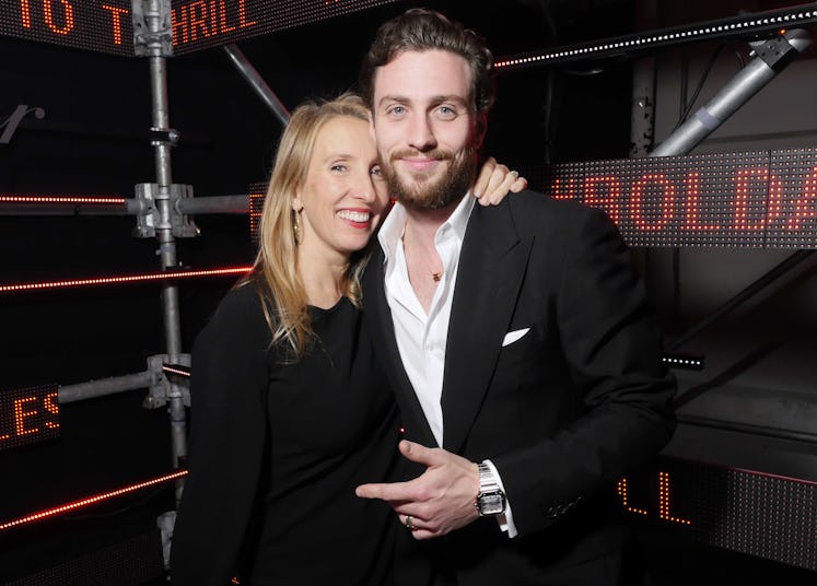 Sam Taylor-Johnson and Aaron Taylor-Johnson posing for a photo at the Cartier’s annual party