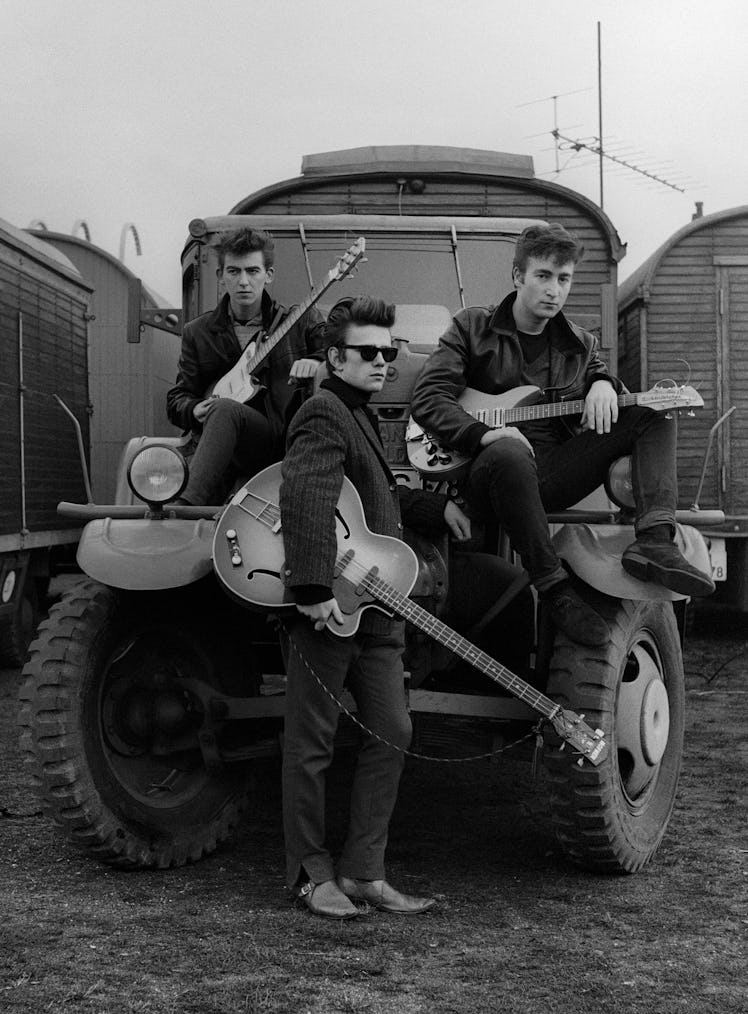 Astrid_Kirchherr_John_Lennon_Stuart_Sutcliffe_and_George_Harrison_on_a_truck_at_the_Fairground_1960_...