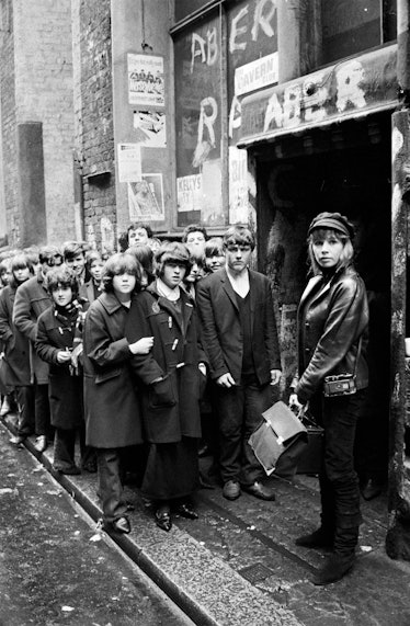 Max Scheler_Astrid Kirchherr_in_front_of_The_Cavern_Club_in_Liverpool_1964_HR.jpg