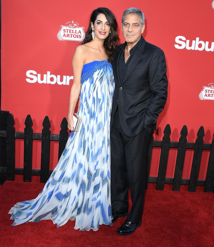 Amal and George on a red carpet