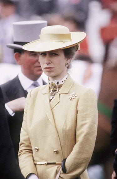 Princess Anne wearing a sleek tan hat