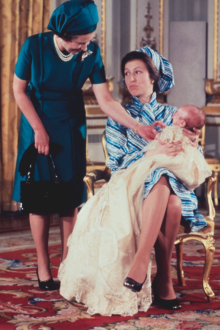 A young Queen Elizabeth II, Princess Anne, and Peter Phillips