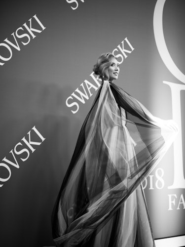 Tao Okamoto posing at the 2018 CFDA Fashion Awards red carpet