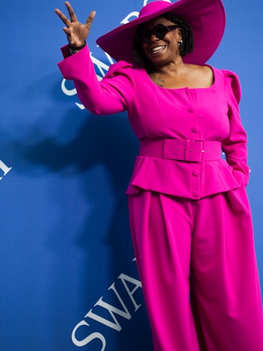 Whoopi Goldberg in a pink blazer, pants, and hat combination at the 2018 CFDA Fashion Awards 2018 re...